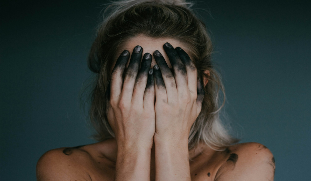 Artistic Expression: A Girl Model with Painted Hands