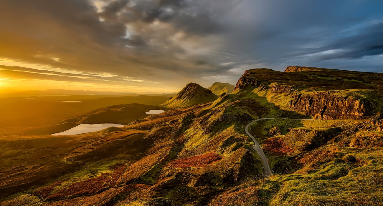 Breathtaking Sunset Over the Scenic Hills and Mountains of Scotland