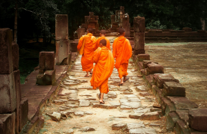 Buddhist Monks Exploring Baphuon Temple in Siem Reap, Cambodia