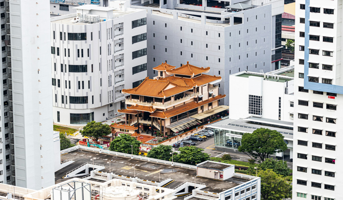 Harmony of Tradition and Modernity: A Temple Amidst Skyscrapers