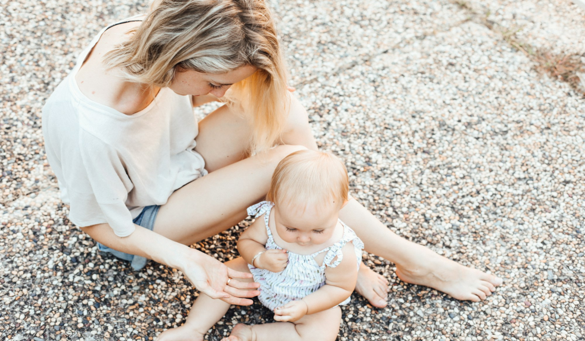 Summer Moments: A Woman and a Baby Enjoying Outdoor Leisure Time