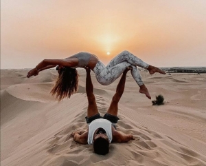 Unveiling Love through Acrobatic Discovery in a Desert Sunset